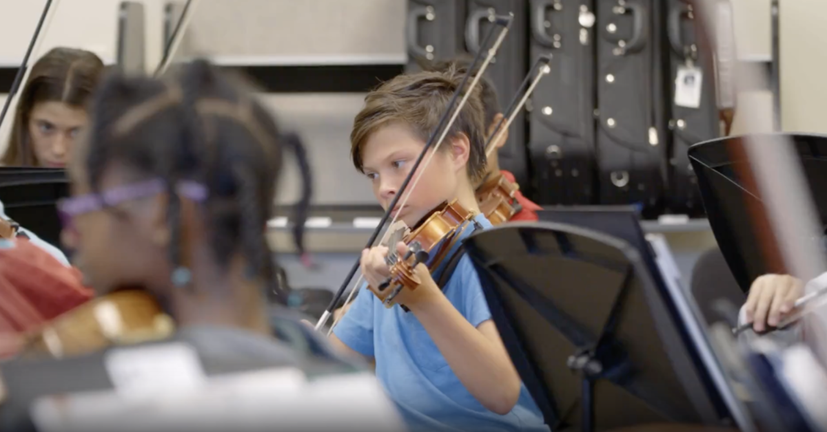 Westminster student playing violin