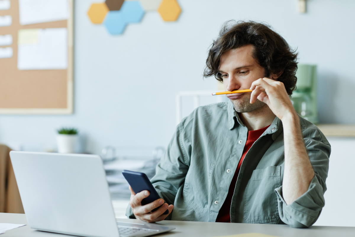 Stock image of a student procrastinating